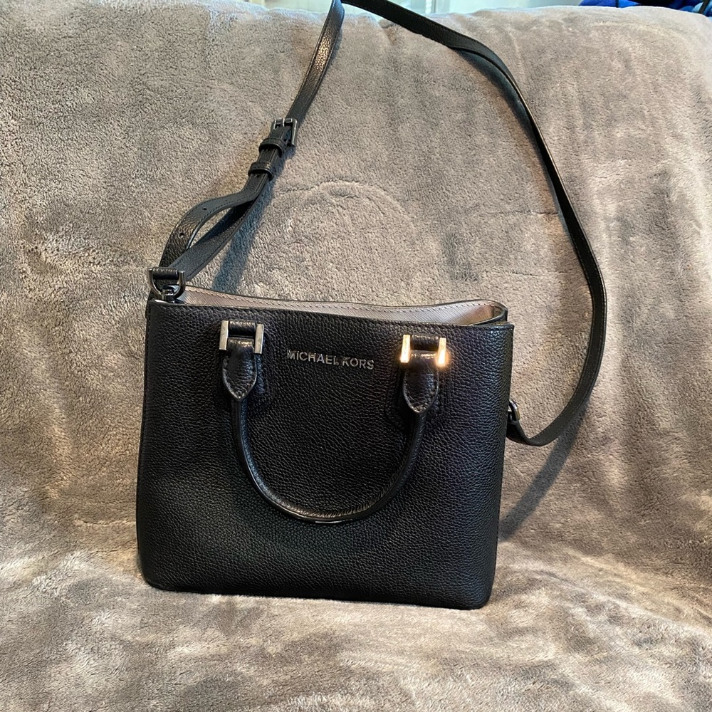 Small sized cross body Michael Kors bag